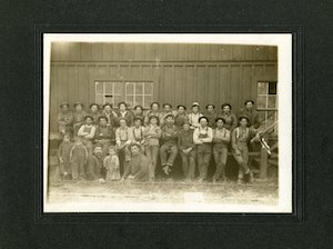 Large group of workmen posing for photo