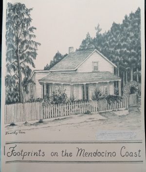 Drawing of a house with a porch behind a fence and surrounded by trees. "Footprints on the Mendocino Coast" is written across the bottom of the drawing.