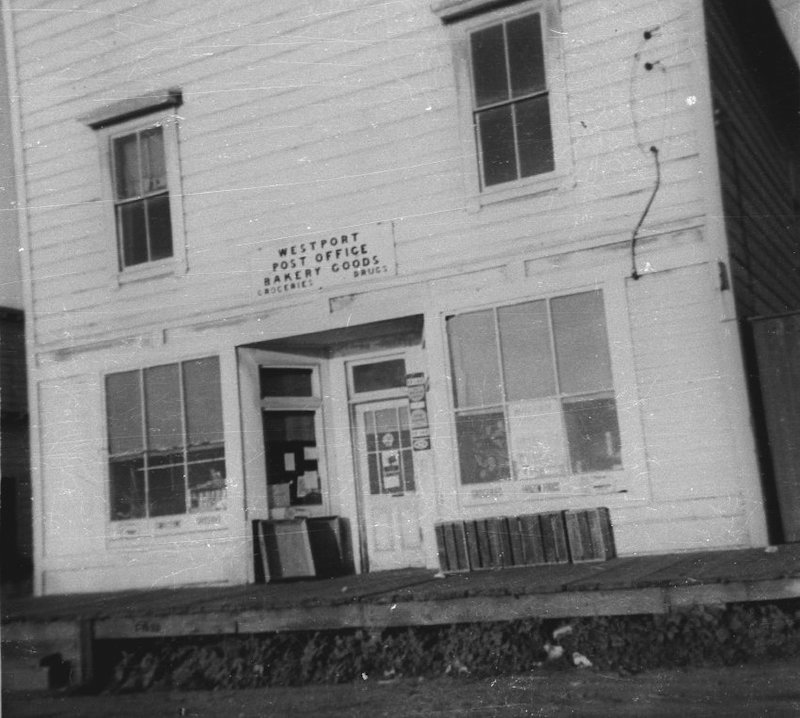 Old-time Store Front. Sign over door reads Westport Post Office, Bakery Goods, Groceries, Drugs