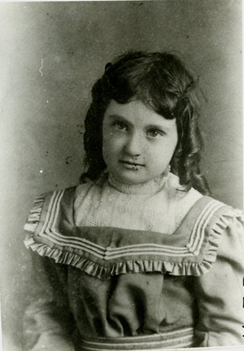 Studio portrait of a young girl, about 10 years old
