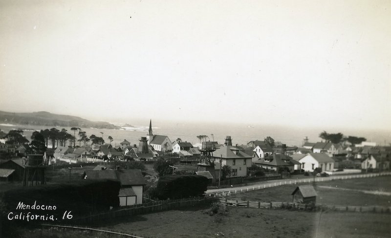 Distance view of the east side of the town of Mendocino, with Chapman's Point in background.