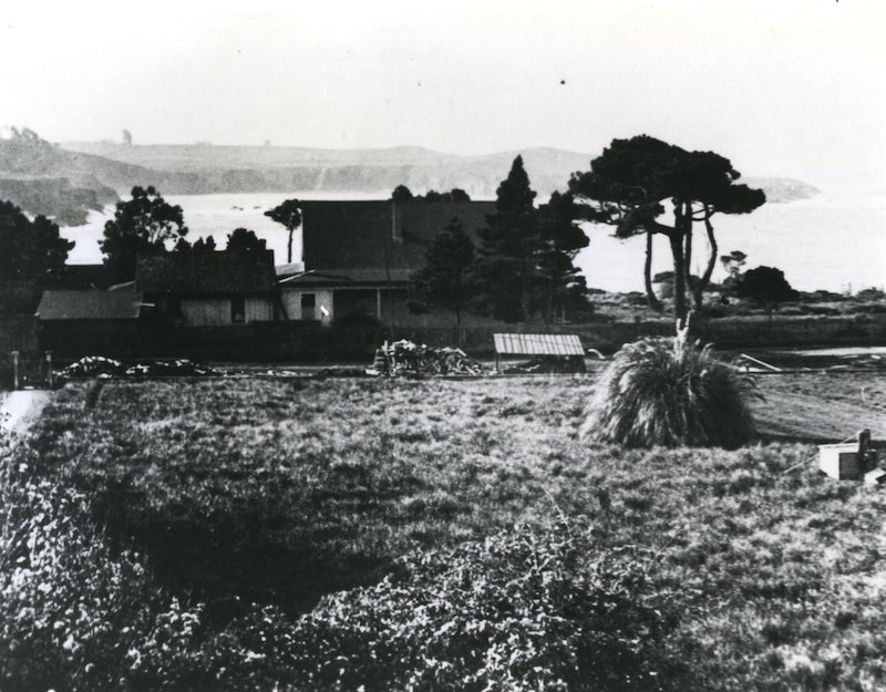 Historic house on bluffs above bay