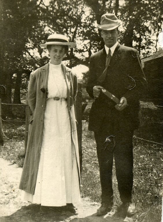 Standing couple, facing camera