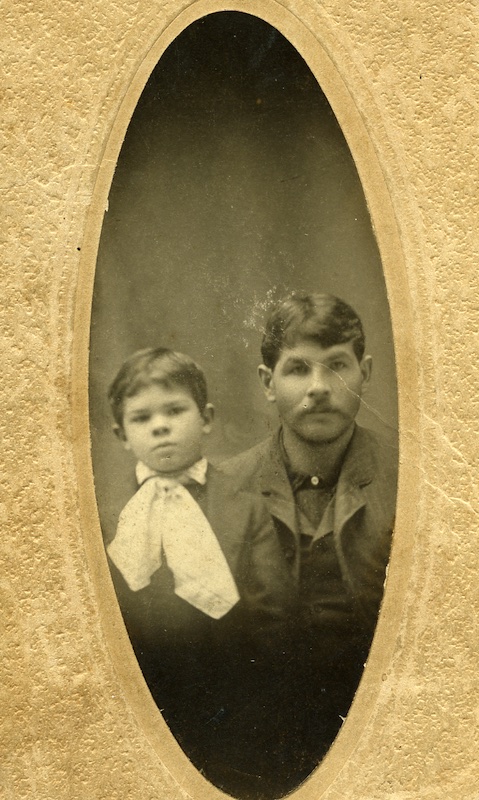Portrait of a young boy and man