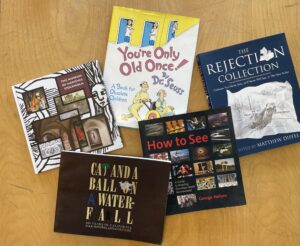 five books on a table