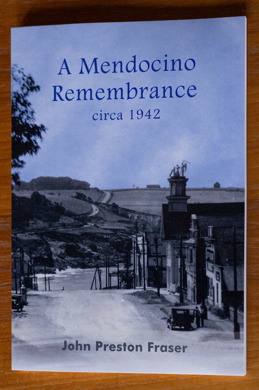 Book Cover showing historic photo looking down an unpaved street