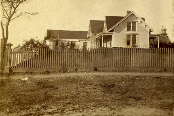 Black and white photo of a historic house