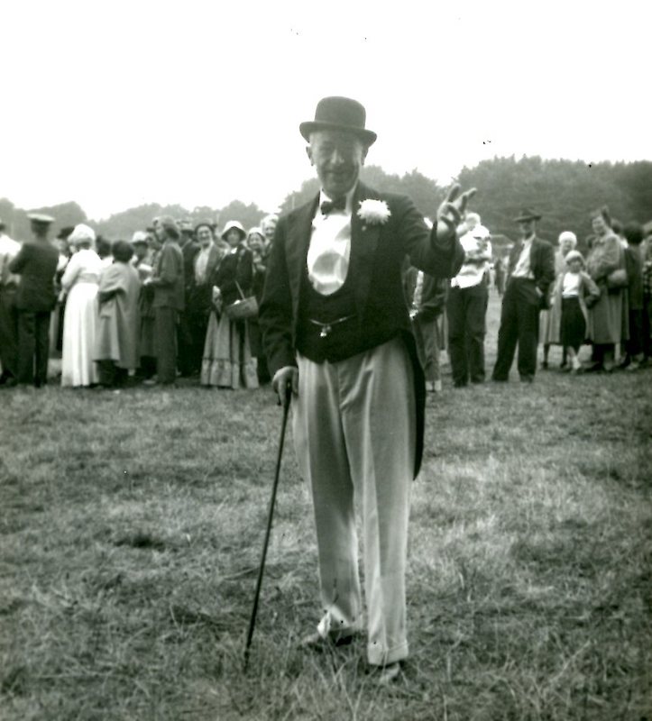 Man in historical clothing with cane