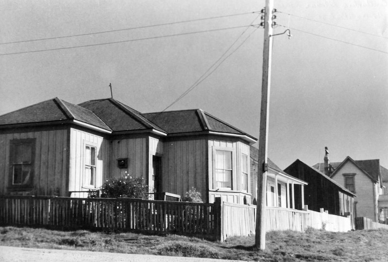 Black and white photo of historic house