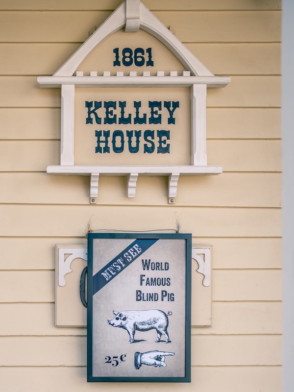 Sign reads "Must See - World Famous Blind Pig - 25 cents"