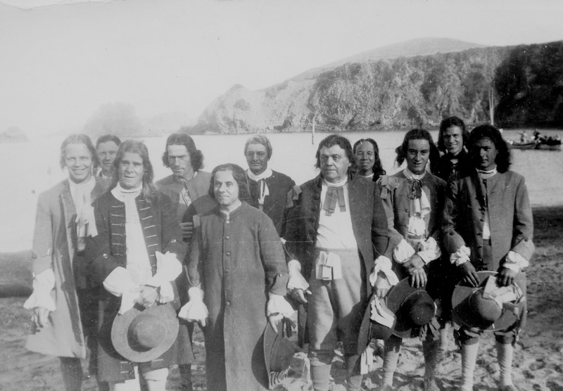 Men in period costume facing camera