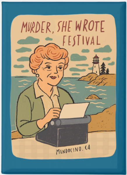 magnet showing redheaded woman typing with ocean behind her