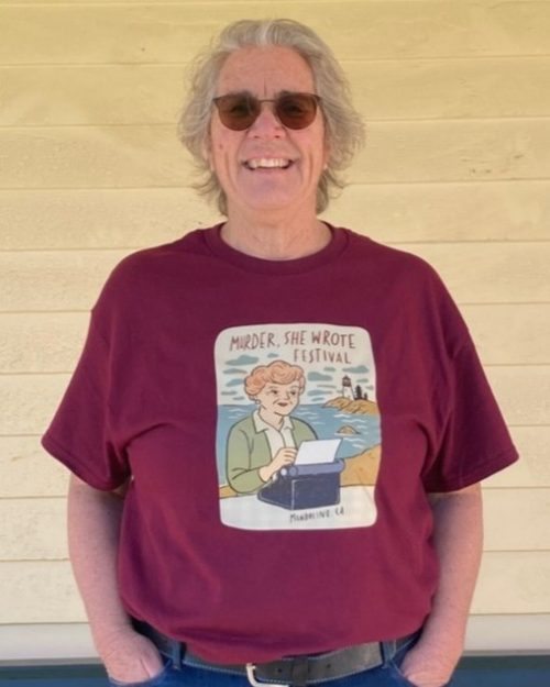 woman in sun glasses wearing red t-shirt