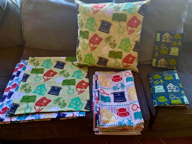 Dishtowels, decorative pillowcases, book jackets