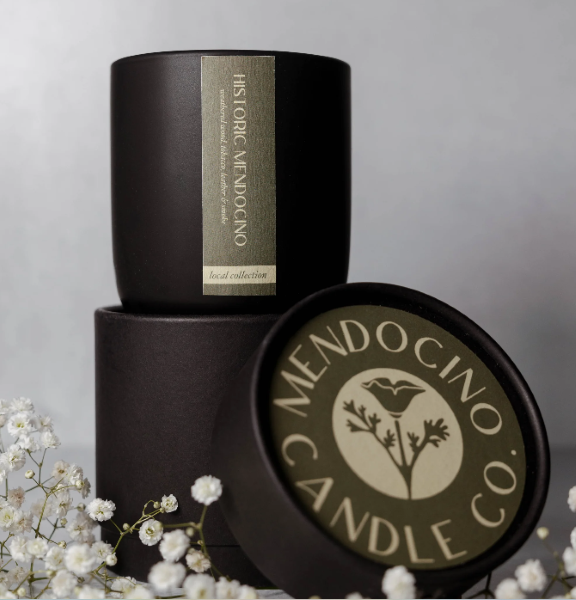 Black candle with flower