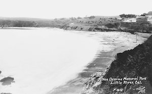 Photo of a beach surrounded by headlands labeled "Van Damme Memorial Park, Little River, Cal."