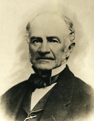 Portrait of an older man wearing a suit