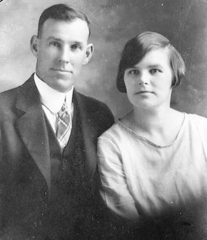 Studio portrait of a well-dressed man and woman