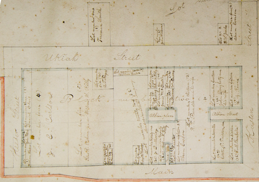 Faded handwritten street and property map