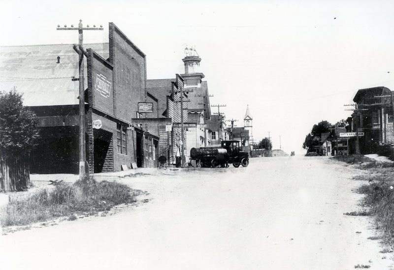 Buildings along an unpaved street